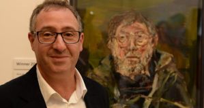Nick Miller with his winning portrait of Barry Cooke